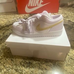 Woman’s size 11.5 or Men 9.5 Jordan 1 lows (new in box)